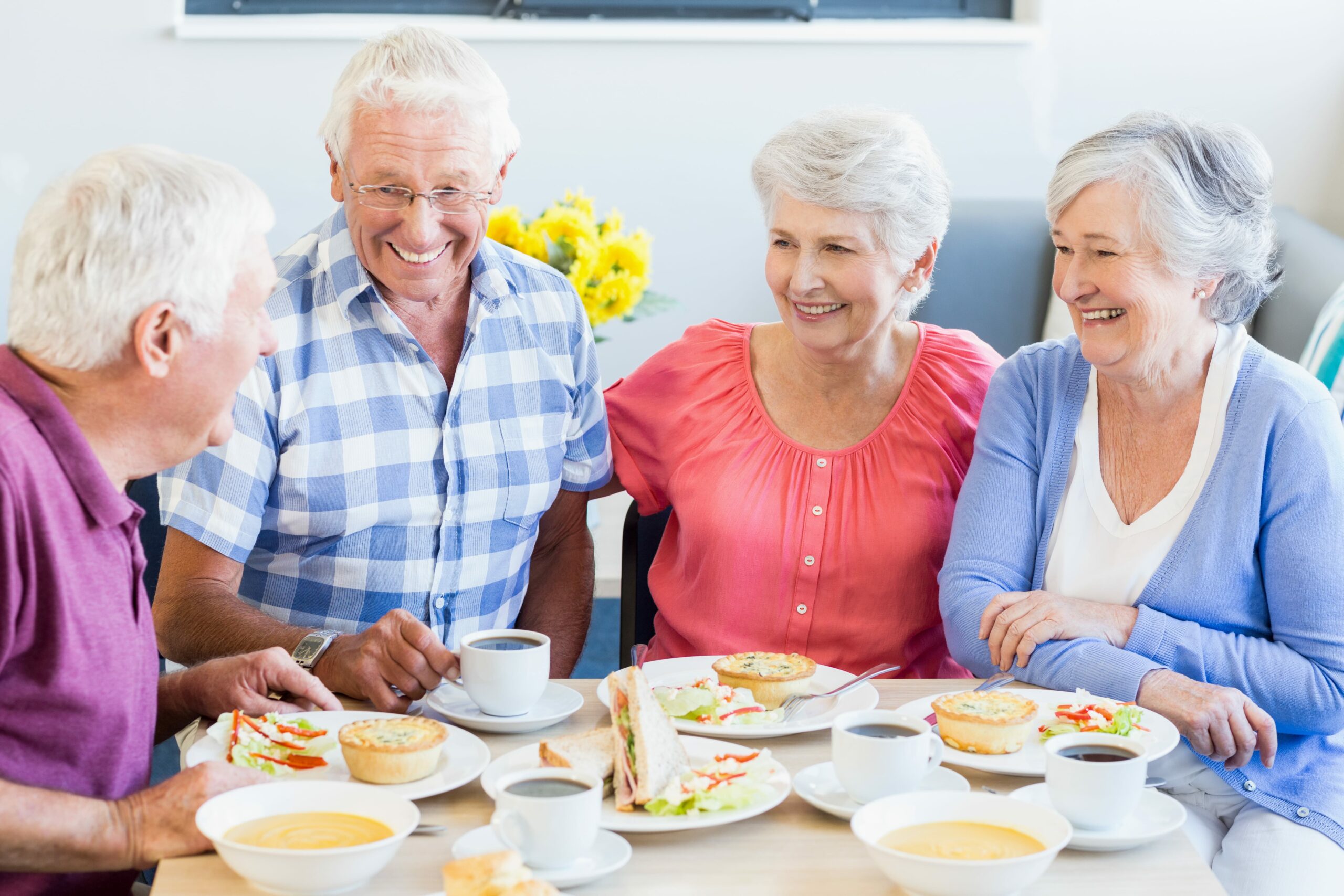 Older adults in nursing home eating a balanced meal