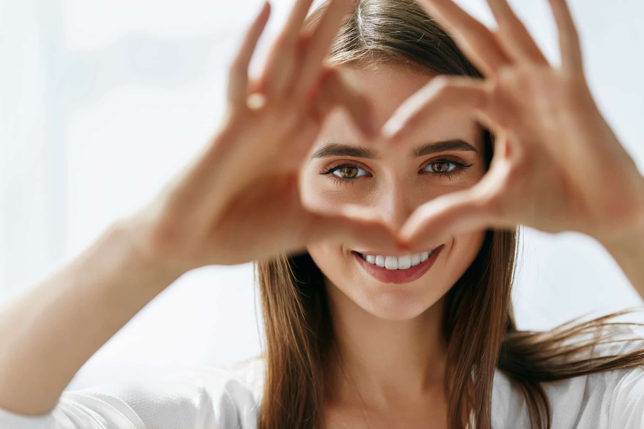 Woman making heart with her hands