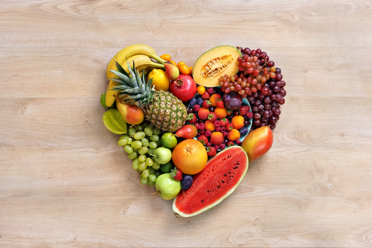 Heart healthy foods in the shape of a heart