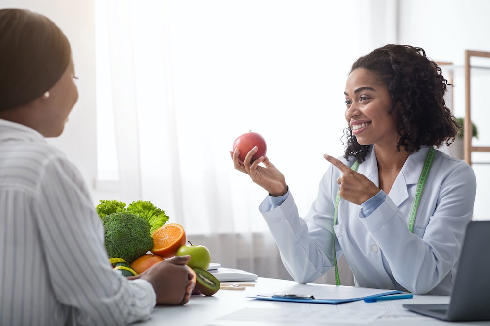 Female nutritionist advising on dietary guidelines