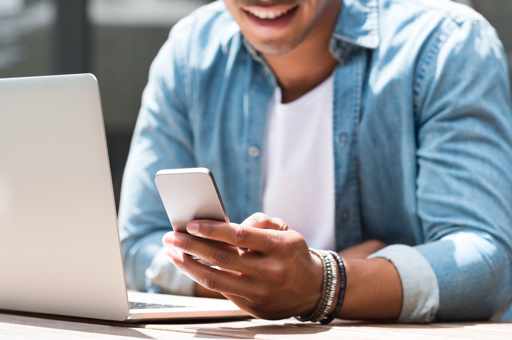 Man checking email on his phone