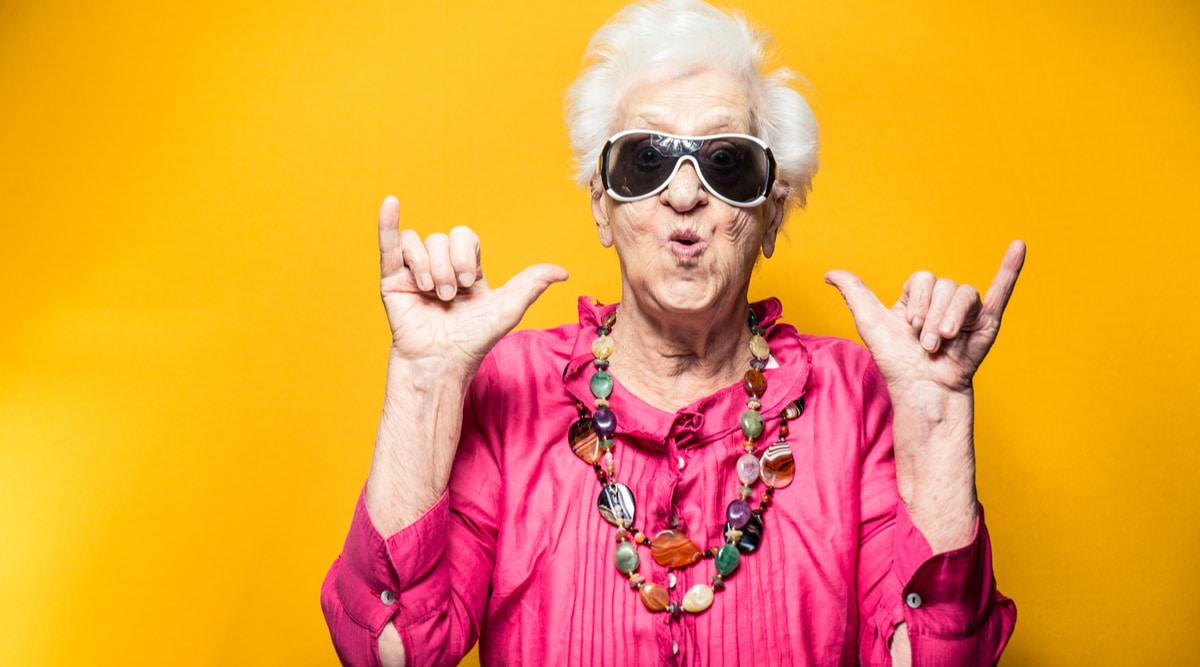 Happy old woman with sunglasses